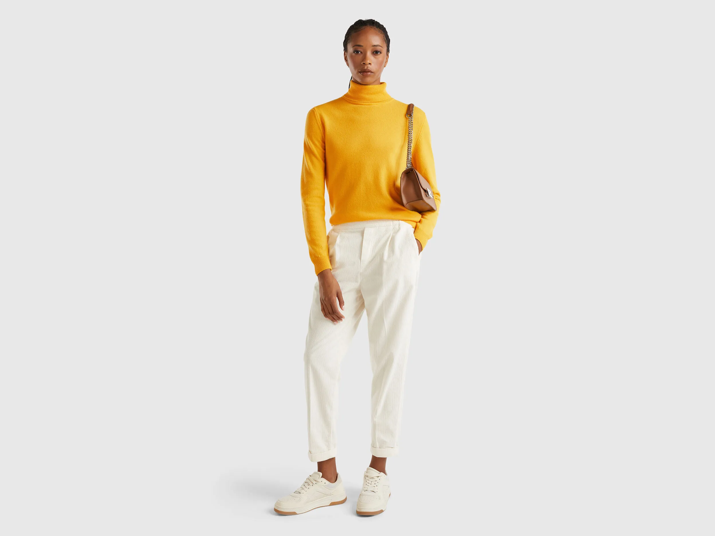 Yellow ochre turtleneck sweater in pure Merino wool - Mustard | Benetton